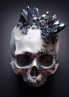 a skull with spikes on it's head is shown in this artistic photo, which appears to be made out of crystals