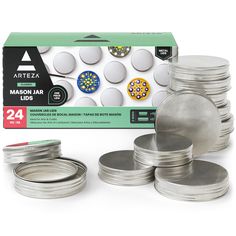 an assortment of metal discs and lids