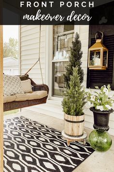 the porch is decorated with potted plants and hanging from chains on the front door