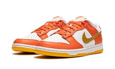 The Women’s Nike Dunk Low “Golden Orange” is a women’s-exclusive version of the retro basketball shoe in a colorway based on an original option from 1985.  The shoe in question is the “Syracuse” Dunk High, a white and orange colorway from the college basketball-inspired “Be True to Your School” collection.  Like the “Syracuse,” the “Golden Orange” features a white leather base with contrasting orange leather overlays.  Unlike the “Syracuse,” the “Golden Orange” dons a Golden Orange-colored leath Womens Dunk Low, Wmns Dunk Low, Retro Basketball Shoes, Retro Basketball, Kicks Shoes, Adidas Boost, School Collection, Orange Shoes, Air Jordan Sneakers