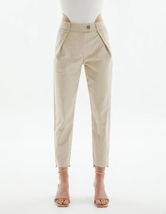 Pleated pencil pants have a tapered fit, that doesn’t limit movements. The cut is free in the hips area. The pants have two side pockets, hidden zip, and a metal button in the middle. The pants are made from high-quality cotton in a basic light beige color that makes it easy to match them with other hues and patterns. Pleat trousers are one inch shorter on the front, so You could combine them with any type of footwear. Composition: 95% cotton, 5% elastane. Care: We recommend a professional dry c Beige Office Bottoms With Pockets, Beige Tapered Leg Work Pants With Belt Loops, Beige Ankle-length Cargo Pants For Work, Beige Trousers With Hip Pockets, Beige Straight Leg Pants For Office, Neutral Pants With Welt Pockets For Business Casual, Chic Beige Tapered Leg Chinos, Fitted Beige Tapered Leg Pants, Beige Work Pants With Hip Pockets