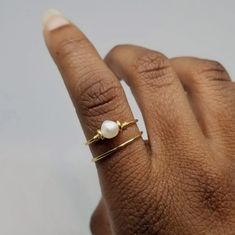 Freshwater Pearl Gold Wire Ring | Etsy Dainty Adjustable Gold Pearl Ring, Gold Adjustable Pearl Drop Ring, Adjustable Gold Pearl Drop Ring, Adjustable Delicate Yellow Gold Pearl Ring, Adjustable Gold Stackable Pearl Ring, Adjustable Stackable Gold Pearl Ring, Minimalist Adjustable Pearl Ring With Charm, Gold Wire Ring, Bead Bar