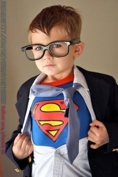 a young boy wearing glasses and a superman t - shirt with the word best 25 + superhero photo ideas on pinterest