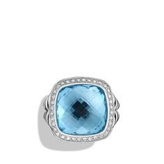 This ring features a primary gemstone of blue topaz and secondary gemstones of diamonds, set in sterling silver. The elegant design is part of the New Albion collection. Petite Ring, David Yurman Jewelry, Pinky Ring, David Yurman, Womens Jewelry Rings, Pave Diamonds, Blue Topaz, Diamond Rings, Ring Shopping