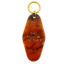 this must be the place keychain in tortoise shell with gold accents