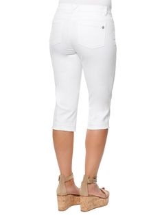 A fresh for warm-weather length and wash cut from soft-stretch premium denim for all-day comfort. This Capri length "Ab"solution® white skimmer jean is designed with power-mesh panels for total tummy control, a no-gap elastic waistband, and curved shaped pockets along with a sweetheart yoke for an instant "booty lift!" Optic white stretch jean Mid-rise Zipper fly with button closure Destruction detail Five-pocket style that includes and angeled coin pocket for a figure-flattering effect Skimmer White Stretch Jeans, Mesh Panel, Premium Denim, White Denim, Stretch Jeans, Warm Weather, Stretch Denim, Snug Fit, White Jeans