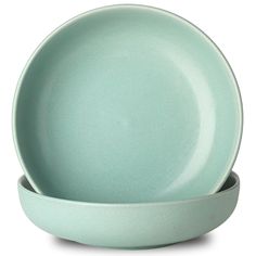 two green bowls with one empty bowl on the side