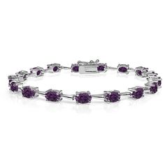 Wear this stylish tennis bracelet to enhance your daytime and evening attire. This stunning dainty bracelet features oval-cut 6x4mm prong-set stones made with Swarovski Crystals. This delicate bracelet measures 7.25 inches and secures by box and tongue plus a safety latch. The bracelet is crafted of fine sterling silver and is nickel & tarnish free. This trendy bracelet in fine jewelry is a great addition to your 925 silver jewelry and Swarovski jewelry collections. Product Details Metal Type st Trendy Bracelet, Blue Topaz Bracelet, Trending Bracelets, Trendy Bracelets, Dainty Bracelet, Dainty Bracelets, Purple Stones, Swarovski Jewelry, 925 Silver Jewelry