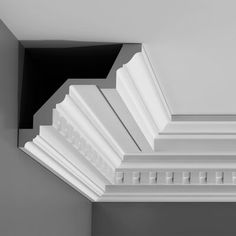 an image of a white corbge with black trimmings on the ceiling