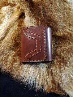 A beautiful vegetable tanned leather wallet of "high class" quality in three sections. Tan color with stitched pattern on the front Compact: 5 spaces for cards (Each space can accommodate at least two. ) Space for tickets Stores in the back pocket of the pants Dimensions closed: 3 3/4 x 41/8 " 9.5 x 10.5 cm Available in other classic colors on request. Possibility of two colors on the same wallet. It is then necessary to count a maximum of 4 days before sending. Do not hesitate to contact me if Leather Trifold Coin Purse With Interior Card Slots, Trifold Leather Coin Purse With Card Slots, Trifold Leather Coin Purse With Interior Card Slots, Leather Trifold Coin Purse With Card Slots, Handmade Artisan Leather Trifold Wallet, Artisan Handmade Leather Trifold Wallet, Hand-stitched Trifold Wallet For Everyday Use, Hand-stitched Trifold Wallet, Everyday Hand-stitched Trifold Wallet