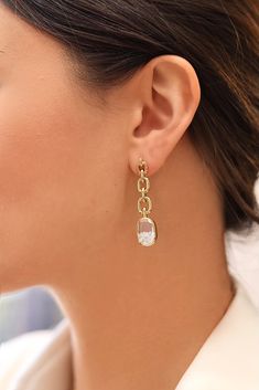 The Elo Drop Earrings feature free-floating diamonds within white sapphire windowpanes. This delicate silhouette demands a second look, as each light-catching stone gently shifts with your every move. Add a dash of intrigue to your everyday repertoire with these versatile stunners. Modern White Diamond Earrings With Single Cut Diamonds, Modern Diamond Drop Earrings With Single Cut Diamonds, White Dangle Earrings With Single Cut Diamonds, Modern Linear Earrings With Diamond Accents, Modern White Teardrop Diamond Earrings, Modern Drop Diamond Earrings, Modern Pierced Diamond Earrings For Wedding, Modern Wedding Diamond Earrings Pierced, White Sapphire