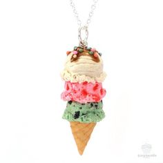 an ice cream sundae necklace on a chain