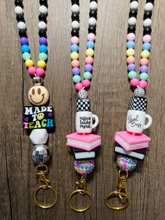 three lanyards with coffee cups and candy on them