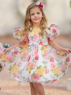 As fresh as the season's first blooms, our puff sleeve floral dress is a sight to behold. Its voluminous silhouette is decorated with the prettiest blossoms for a head-turning look. Dreamy, flouncy, and extra fabulous. Voluminous design adds a puff-tastic bounce to her steps, captivating everyone in the room. Sunshine-ready floral print brightens up her mood and boosts her confidence too. Perfect for spring, dressy events, birthday parties, special occasions, photoshoots, and year-round fashion Spring Puff Sleeve Dress For Dress-up, Spring Fitted Puff Sleeve Dress For Dress-up, Fitted Puff Sleeve Dress For Dress-up In Spring, Puff Sleeve Floral Dress, Short Princess Dress, Cute Sundresses, Birthday Sweater, White Floral Dress, Pink Floral Dress