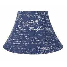 a blue lamp shade with writing on the bottom and white letters all over it,