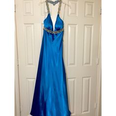 Beautiful Blue Formal Long Dress Still Has Tags! Blue V-neck Dress For Prom Season, Blue Dresses For Prom Season, Blue Prom Season Evening Dress, Blue Floor-length Dress For Prom Season, Blue Floor-length Dresses For Prom, Blue V-neck Prom Dress, Blue Floor-length Dress For Night Out, Blue V-neck Evening Dress For Prom Season, Blue V-neck Maxi Dress For Prom