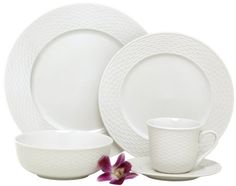 white dinnerware set with purple flowers on the side