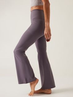 FOR: Yoga or studio practice FEEL: Powervita™ fabric is buttery soft with support that feels like a gentle hug FAVE: Bonded side stash pockets hold your essentials Made with our customer-favorite, second-skin Powervita™ fabric, our yoga leggings/ Stretch Mid-rise Yoga Pants With Side Pockets, Functional Yoga Bottoms With Contoured Waistband, Functional Yoga Bottoms With Comfort Waistband, Functional Bottoms With Comfort Waistband For Yoga, Wide Leg Activewear With Pockets And 4-way Stretch, Solid Color Compressive Yoga Pants, Compressive Solid Yoga Pants, Yoga Pants With Compressive Comfort Waistband, 4-way Stretch Bottoms For Pilates