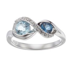 Elevate your ensemble with the unending beauty of this blue topaz and lab-created white sapphire infinity ring.RING DETAILSWidth: .32 in. Metal: sterling silverPlating: rhodiumFinish: polishedPackaging: boxedSTONE DETAILSStone type: sky blue topaz, London blue topaz, lab-created white sapphireTotal weight: 1 1/8 ct.Shape: roundSetting: channel, prongGemstones may have been treated to enhance their appearance. Special care may be required. Size: 6. Gender: female. Age Group: adult. Sapphire Necklace Pendants, White Sapphire Ring, Topaz Jewelry, Bypass Ring, Infinity Ring, Right Hand Rings, Sapphire Pendant, Sky Blue Topaz, Blue Gems