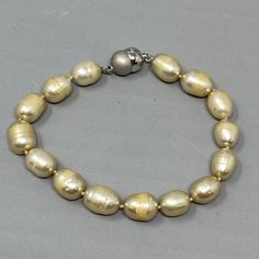 Genuine Pearl Bracelet Cream Baroque Beads Vintage Hand Knotted Magnetic Clasp Elegant Gold Stretch Bracelet With Large Beads, Elegant Gold Bracelets With Large Beads, Party Pearl Bracelet With Gold Beads, Elegant Large Beads Bracelets For Party, Elegant Large Beads Bracelet For Party, Party Pearl Bracelet With Gold Round Beads, Elegant Party Bracelets With Large Beads, Elegant Large Beaded Bracelets For Party, Elegant Silver Bracelets With Large Beads