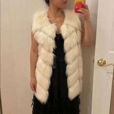 Nwt. In Perfect New Condition. White Faux Fur Vest. Lined. 100% Acrylic. Length 29". Chest 36". Hidden Closure. True To Size Xs. No Trades. Chic Fitted White Fur Coat, Fitted White Fur Coat For Spring, White Faux Fur Vest, Faux Fur Vest, Faux Fur Vests, White Faux Fur, Fur Vest, Faux Fur, Color White