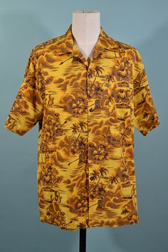 a yellow hawaiian shirt with palm trees and clouds on the front, sitting on a mannequin's head