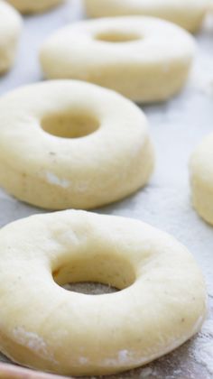 doughnut dough on parchment paper ready to be fried. Yeast Donuts Recipe, Coconut Donut Recipe, Coconut Donut, Yeast Doughnuts, Cream Donut, Donut Cupcakes, Doughnuts Recipe