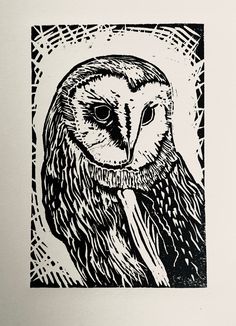 an owl is shown in black and white on a piece of paper that has been drawn