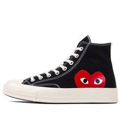 With a playful red peekaboo heart designed by New York graphic artist Filip Pagowski on the side panels, these Converse Comme des Garcons x Chuck Taylor All Star Hi Play sneakers are perfect for anyone who wants to show their fun and stylish side. The black canvas upper is contrasted with a white stripe on the heel, and an Off-White toe cap. With a vulcanized rubber midsole, these sneakers are sure to provide hours of comfortable wear. (SNKR/Unisex/High Top/Crossover/Kawakubo Rei) Flat Sneakers With Contrast Sole For Streetwear, Black Flat Canvas Shoes With Rubber Sole, Comfortable Black High-top Sneakers With Vulcanized Sole, Black Flat Heel Sneakers With Rubber Sole, Streetwear High-top Sneakers With Vulcanized Sole, Comfortable Black Sneakers With Vulcanized Sole, Black Flat Heel Sneakers For Streetwear, Casual Black Sneakers With Vulcanized Sole, Black High-top Casual Sneakers