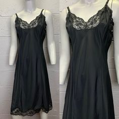 Vintage black matte crepe remarque slip dress with lace trim by Barbizon. Black nylon, polyester and rayon blend with a smooth matte finish. Lace trim at the bust and at the hem.  Adjustable ribbon straps.  Good condition. No noted flaws. Tagged size 38 Fits like a size Medium/Large. Laid flat and measured. Fabric has no stretch. Bust (armpit to armpit) - 19 inches Waist - 17 inches Hips - 22 inches Length - 44 at the longest setting Fitted Lace Trim Slip Dress For Night, Black Slip Dress With Contrast Lace For Night Out, Black Lace Slip Dress With Bias Cut, Fitted Black Slip Dress With Lace Trim, Black Lace Bias Cut Slip Dress, Black Lace Trim Camisole Slip Dress, Black Camisole Slip Dress With Lace Trim, Black Slip Dress With Contrast Lace, Fitted Black Slip Dress For Daywear