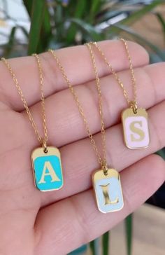 "The coolest initial necklaces just released!! These dog tag personalized necklaces come on a beautiful paper clip chain. They are 16\" (and come with a 2\" extension) -sterling silver -14K gold plated -stamped 925 **In the \"letter to seller\" section please include your email address and your initial Free shipping in the US! If you have questions please don't hesitate to ask. Happy shopping!!" Personalized Enamel Charm Necklaces For Gifts, Personalized Enamel Jewelry For Everyday, Everyday Personalized Enamel Jewelry, Enamel Initial Pendant Jewelry Gift, Personalized Silver Charm Necklace In Enamel, Personalized Silver Charm Necklace With Enamel, Trendy Personalized Initial Necklace, Personalized Silver Enamel Charm Necklace, Mother's Day Personalized Enamel Necklaces