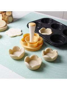 an image of some food being made on the table with it's cutters