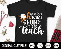 a black shirt with the words what fun it is to teach and a snowman