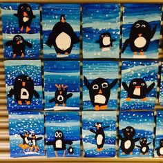 many penguins are painted on blue and white paper