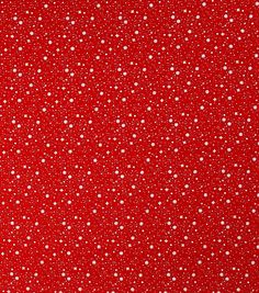 a red background with white polka dots