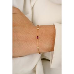 This is part of Chairish’s Fine Jewelry assortment.  This Minimal Natural Ruby Diamond Chain Bracelet in 18K gold showcases 0.32 carats endlessly sparkling natural ruby and 0.05 carats of diamond. It measures 7 inches long in length.  Ruby improves mental strength. Designed with oval cut ruby and diamond set in bezel settings to make you stand out on any occasion or event. The elegant style complements the attire beautifully and is a perfect Engagement Gift, Bridal Shower Gift, Gift For Love, Gi Elegant Yellow Gold Chain Bracelet With Gemstone, Yellow Gold Ruby Diamond Jubilee Bracelet, Elegant Red Chain Bracelet With Jubilee Design, Yellow Gold Diamond Bracelet With Gemstone, Elegant Red Jubilee Chain Bracelet, Elegant Diamond Bracelet With Birthstone For Formal Occasions, Elegant Diamond Birthstone Bracelet For Formal Occasions, Elegant Red Bracelet With Birthstone, Elegant Red Birthstone Bracelet