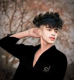 a young man with black hair and piercings on his ears wearing a black shirt