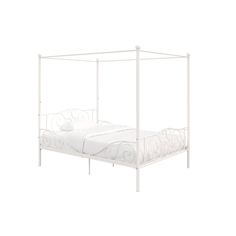 a white metal bed frame with four posts