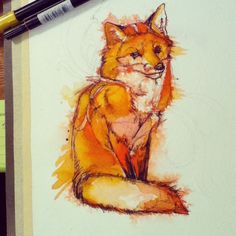 a drawing of a fox sitting on top of a piece of paper