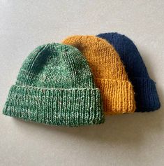 If you need a little pop of color for your winter outfit, this over-the-ear fisherman's cap is perfect for you! Comes in a variety of colors, one size fits most. Hat made to fit just over the ears, as pictured. (Pictured: Yellow, custom green, and dark blue) Mens Cottagecore, Over The, Custom Hats, Hat Making, The Ear, Winter Outfit, Granny Square, Pop Of Color, Caps Hats