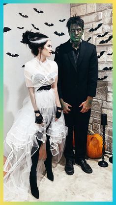 a man and woman dressed up in halloween costumes