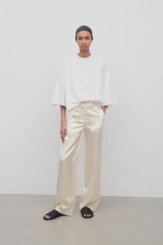 Encore Pant White in Viscose – The Row Sleek Wide-leg Silk Pants, Sleek Silk Wide-leg Pants, Silk Wide Leg Pants With Pressed Crease, Sleek Silk Trousers, Sleek Silk Straight Pants, Sleek Silk Bottoms For Work, Sleek Silk Straight Leg Pants, Silk Wide Leg Bottoms With Pressed Crease, Silk Wide-leg Bottoms With Pressed Crease