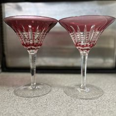 One Pair Of Beautiful Very Rare “Simply Pink” Champagne Glasses By Waterford. These Hot Pink Cut Lead Crystal Glasses Are 7 1/4” High, 5 1/4” Wide At The Top With 4” Stems. The Bottom Of The Glass Is 4 Inches Wide Making Them Very Sturdy Martini Glasses That Hold 8oz. Of Your Favorite Drink! Excellent Condition! These Glasses Are Brand New. Sorry, I Do Not Have The Original Box. They Will Be Professionally Packaged To Ensure No Breakage In The Mail! Crystal Martini Glasses, Crystal Glasses, Martini Glasses, Champagne Glasses, Pink Champagne, Lead Crystal, Favorite Drinks, Very Rare, Martini