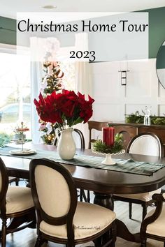 a dining room table with christmas decorations on it