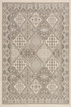 a beige and brown rug with an intricate design