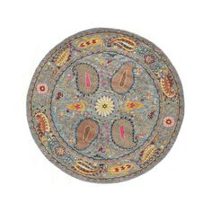 a round rug with various designs on it