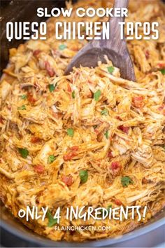 a slow cooker filled with shredded chicken and vegetables