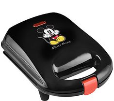 the mickey mouse sandwich maker is black with red trimmings on it's sides