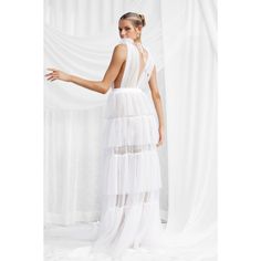 Zendaya Dress - White | Lexi | Wolf & Badger Layered Spring Wedding Dress, Tulle Dress With Ruffled Tiered Skirt, Tulle Dress With Ruffles And Tiered Skirt, White Tiered Dress For Party, White Tiered Ruffle Dress For Wedding, Tulle Dresses With Ruffles And Tiered Skirt, White Tiered Skirt Dress With Attached Cancan, Tiered Tulle Gown For Gala, Tiered Tulle Dress With Ruffles