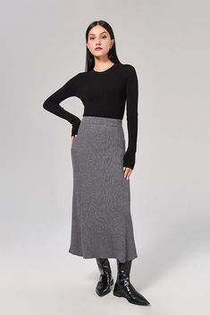 Sophisticated A-line Skirt: Resilient Washable Wool-blend Mastery Our A-line skirt, knit from a blend of washable wool, captures elegance in its purest form. The mid-high waist design elongates the silhouette, while the soft and resilient fabric ensures comfort all day. Style #: WKAI207 Elegant Ribbed Maxi Skirt, Elegant Long Knit Skirt, Elegant Knit Relaxed Skirt, Elegant Relaxed Knit Skirt, Long Relaxed Ribbed Skirt, Knit Midi Skirt With Lining, Elegant Ribbed Skirt For Workwear, Elegant Ribbed Skirt For Work, Elegant Ribbed Skirt